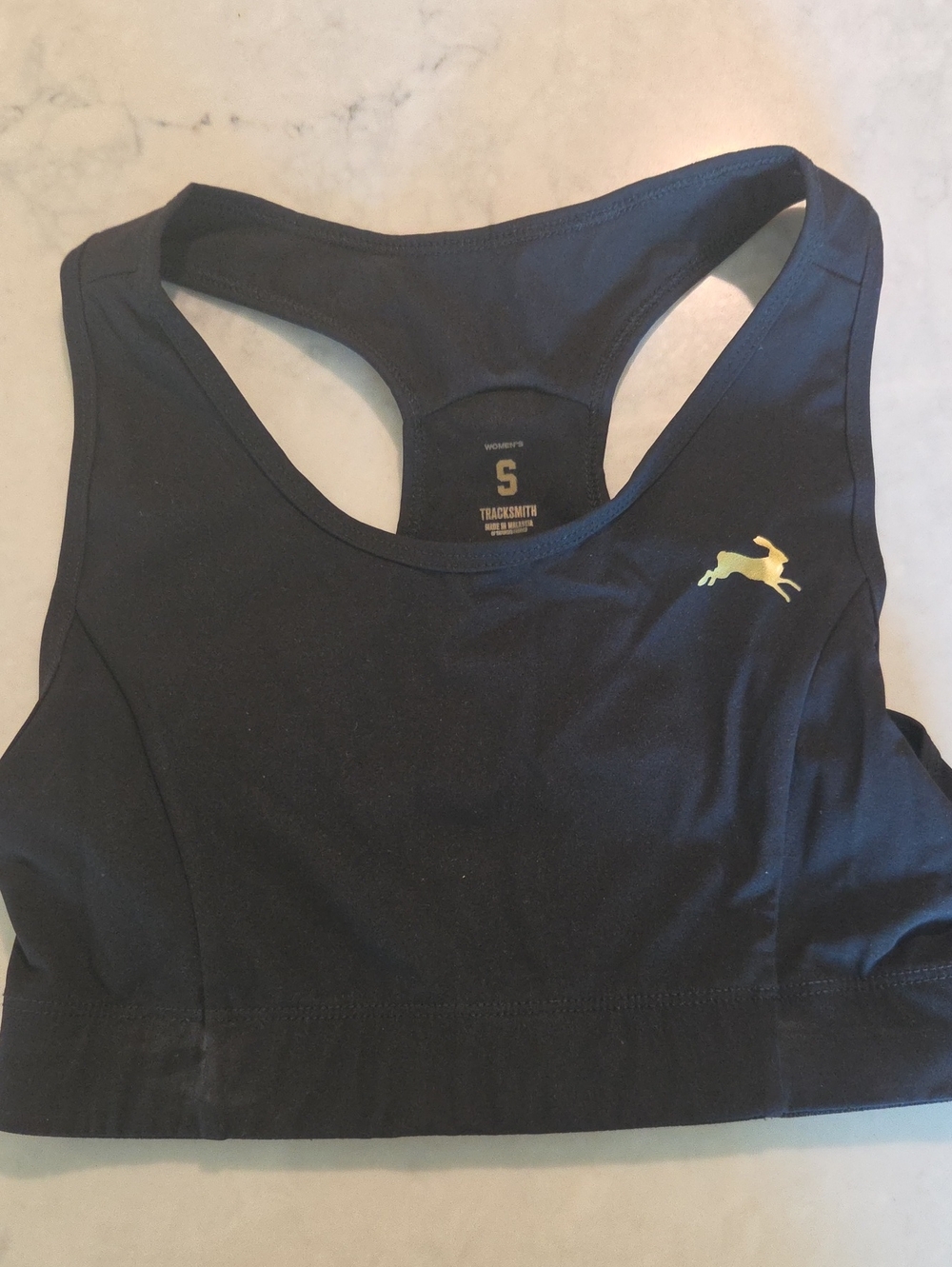 Tracksmith Black Racerback Sports Bra with Gold Hare Emblem